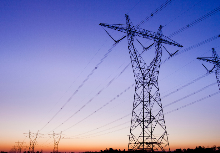 High voltage transmission lines at dusk